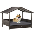 Load image into Gallery viewer, PawHut Wicker Dog House Outdoor with Canopy, Rattan Dog Bed with Water-resistant Cushion, Raised Dog Bed for Small, Medium Dogs up to 66 lbs, 19.75" in Length, Brown Wicker, Gray Cushion