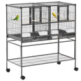 Load image into Gallery viewer, Divided Breeder Bird Cage with Rolling Stand Removable Metal Tray, Storage Shelf, Wood Perch, and Food Container
