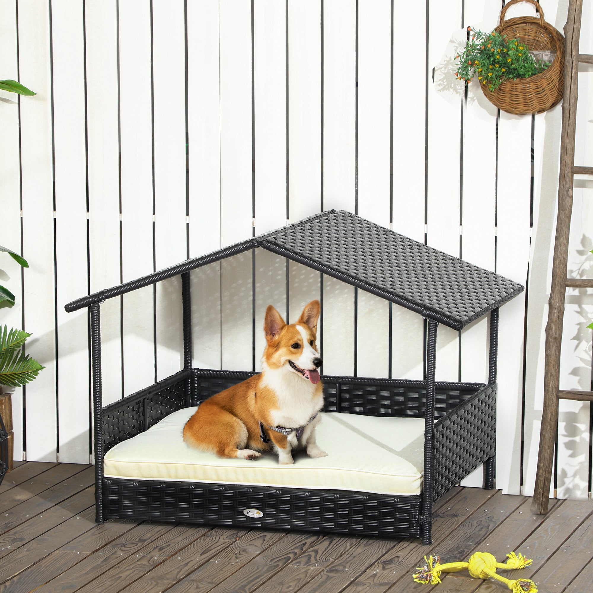 PawHut Wicker Dog House Outdoor with Canopy, Rattan Dog Bed with Water-resistant Cushion, Raised Dog Bed for Small, Medium Dogs up to 66 lbs, 19.75" in Length, Black Wicker, White Cushion