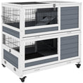 Load image into Gallery viewer, PawHut Indoor Rabbit Hutch with Wheels, 2-Tier Rabbit Cage, 35.5" Wooden Guinea Pig Cage with Feeding Trough, Removable Trays, Ramps & Openable Top for 1-2 Rabbits, Gray
